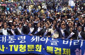 Koreans protest allegations involving Kim's three sons